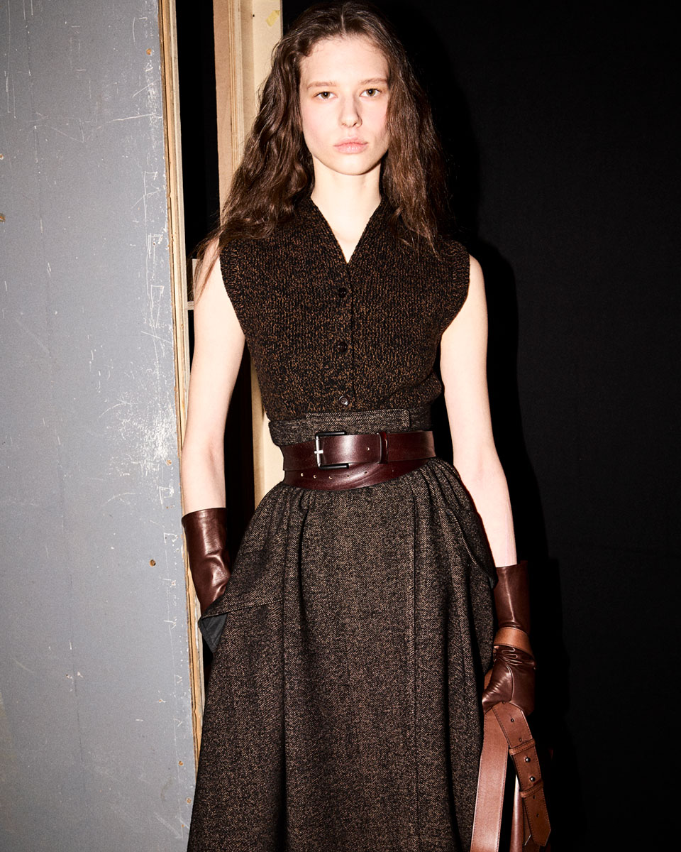 Max Mara Fall/Winter 2025 Fashion Show - Backstage shot of model with Brown Look.