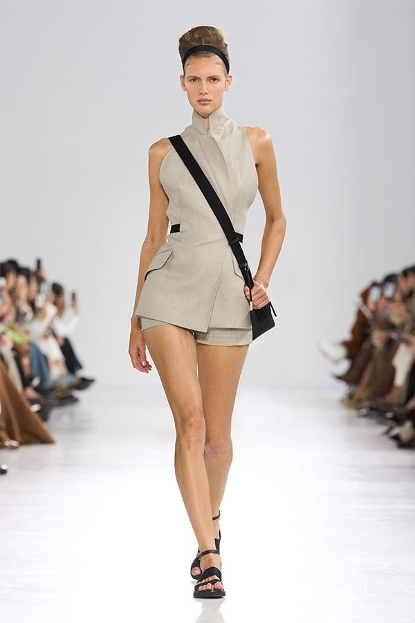 Max Mara Spring/Summer 2026 Fashion Show - Look with Sleeveless Blazer and matching Shorts, with Crossbody Bag.